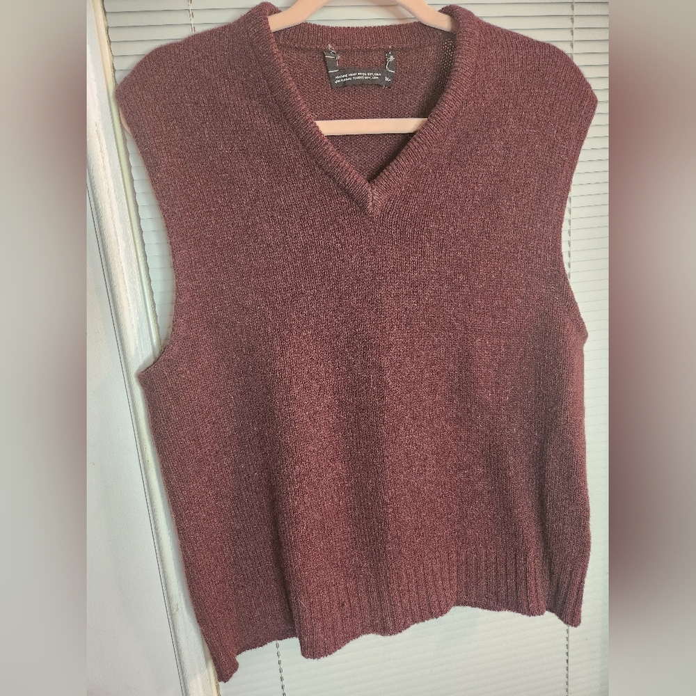 Burgundy sweater vest size med.  p2p 22" at rest but can stretch Very soft box D